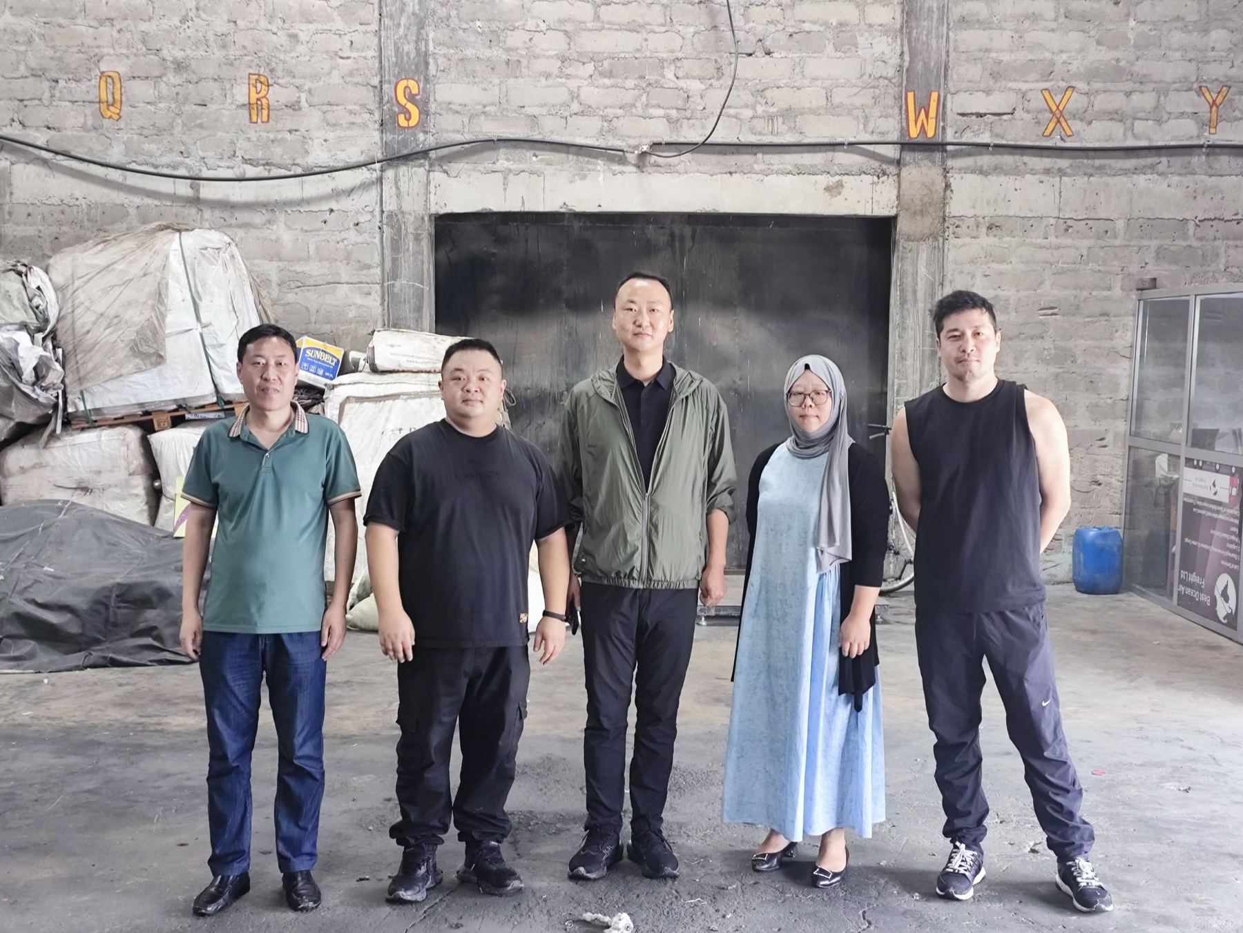 Zhoukun Group team on an overseas warehouse inspection